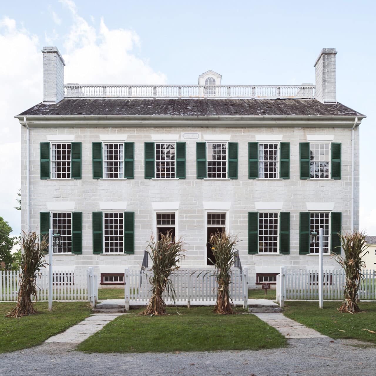 Shaker Village of Pleasant Hill near Harrodsburg, Kentucky, is a historic landmark featuring restored 19th-century Shaker buildings, scenic walking trails, farm experiences, and opportunities to explore the history and simple living of the Shaker community.